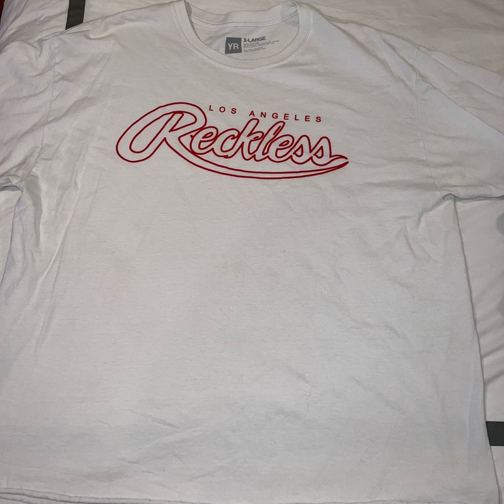 Young and Reckless white tee
